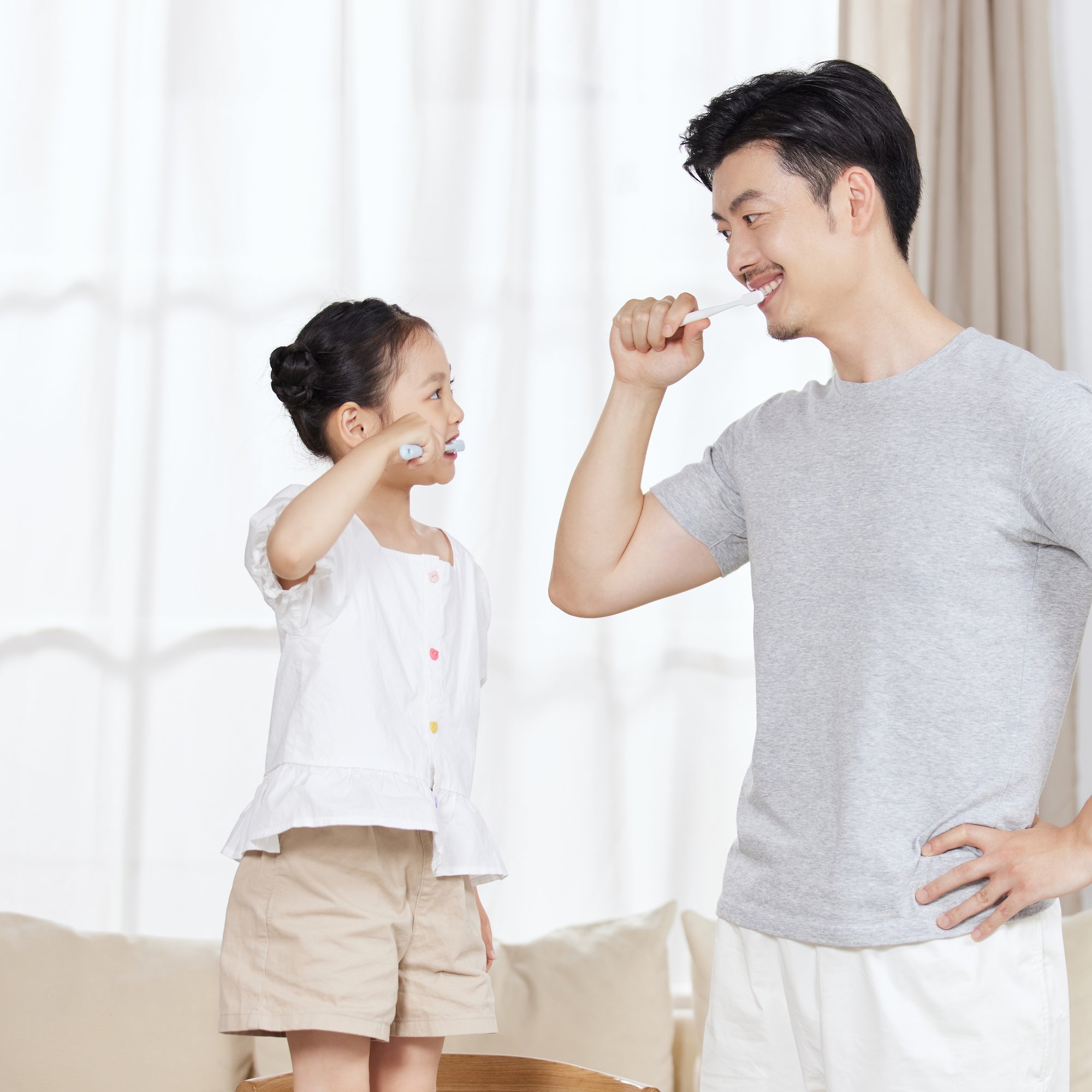 Lovepik_com-501774376-dad-is-brushing-with-your-daughter-together-1
